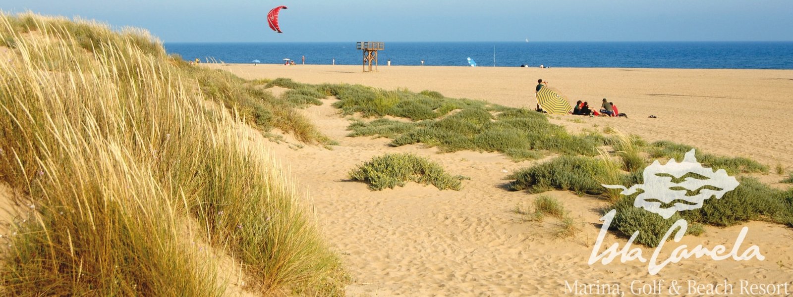 The long sandy beach at Isla Canela resort in Spain